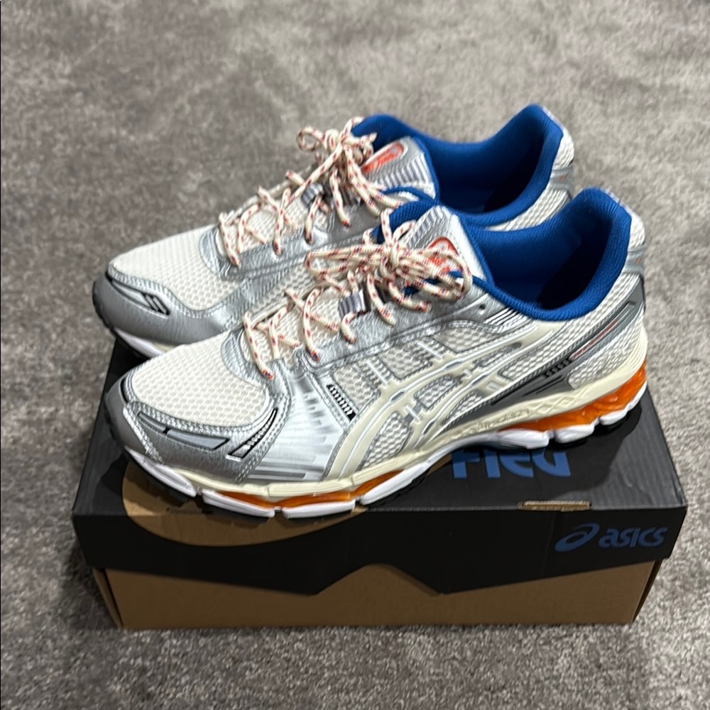 ASICS Silver and Blue Athletic Sneakers
Kith Fieg Gel Kayano 12.1